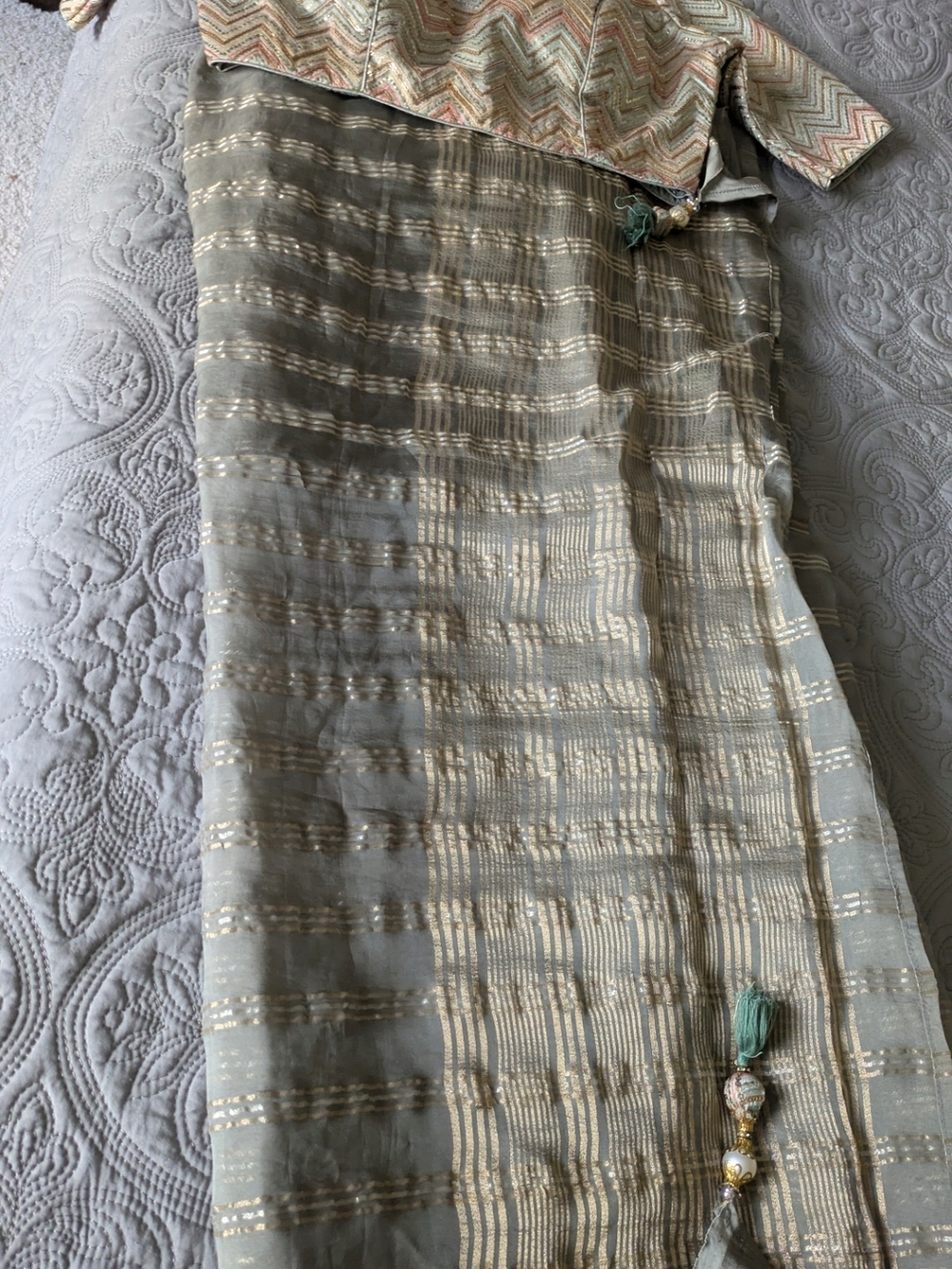 Elegant Gold-Striped Sage Saree
